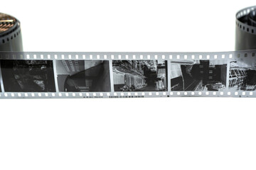 A detailed black and white film negative strip stretched out with visible images.