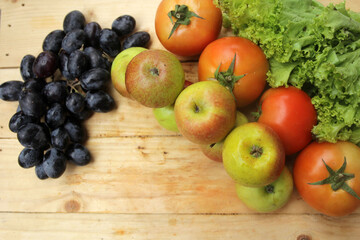 fruits and vegetables on wooden table