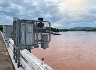 Solar automatic water metering station or water level meter used to measure the water level of the river to help alert villagers to watch out for flooding if the flood level reaches the meter.