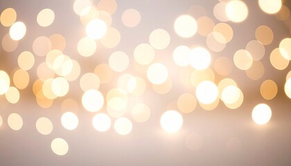 Golden bokeh light effect on a soft beige background, creating a festive and dreamy ambiance.
