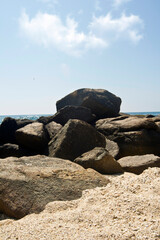 Shoreline Sentinels: Rocks at the Tide&rsquo;s Edge