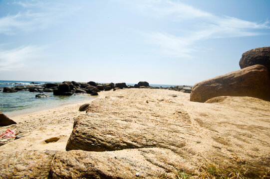 Shoreline Sentinels: Rocks at the Tide&rsquo;s Edge