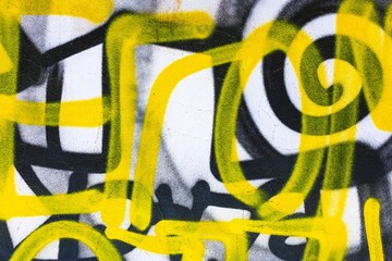 Yellow and black graffiti swirl with bold lines. Urban 2000s, funky style, vibrant contrast. Modern art, street visuals, digital design, vertical format for social media, banner, cover.