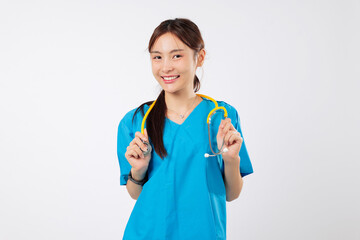 Friendly asian woman portrait, medical nurse, stethoscope holding yellow clinic tools smiles...