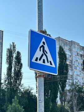 Pedestrian crossing road sign &ndash; urban traffic safety symbol
