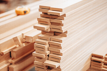 Stacked Wooden Joinery Planks with Precision Slot Cuts