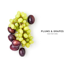 Composition with fresh plums and grapes photography isolated on white background