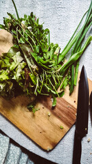 fresh herbs on a wooden board