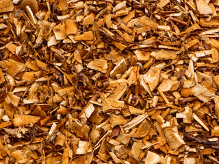 A detailed close-up of a pile of wood chips