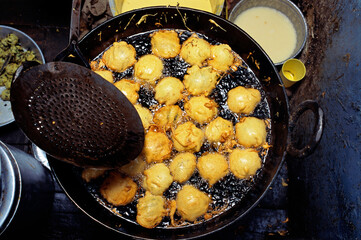 indian potato balls frying india 