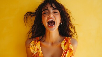 Woman with wide open mouth and closed eyes expressing strong emotions, on yellow background. Emotional expressions, advertising, social networks.