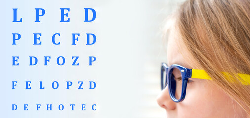 preschool girl wearing blue eyeglasses, clear vision, eyesight correction, medical optics, Focus...