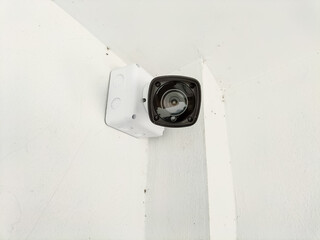 Installation of CCTV cameras on walls inside buildings.