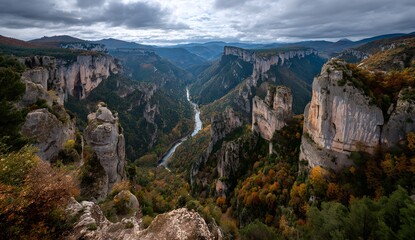 Verdant Vista Geological Formations under Cloudy Skies