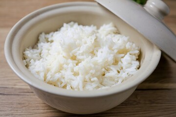 Cooked white rice or steamed rice in a white plate, thai jasmine rice, thai fragrant rice