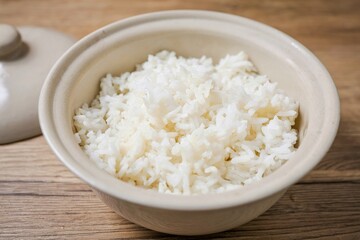 Cooked white rice or steamed rice in a white plate, thai jasmine rice, thai fragrant rice