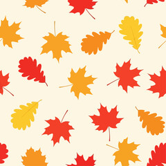 Fototapeta premium Autumnal leaf pattern: red, orange, and yellow maple and oak leaves on a cream background.