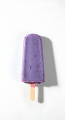 A refreshing blueberry popsicle on a stick, a perfect summer treat. The popsicle has a vibrant purple color, with dark specks throughout, and sits on a wooden stick