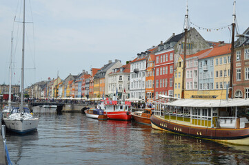 Scenic Colorful Nyhavn harbor with vibrant buildings lining the canal in Denmark.