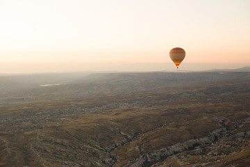 beautiful scenery flight of balloons in the mountains of Cappadocia in love valley