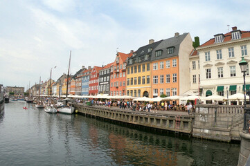 Scenic Colorful Nyhavn harbor with vibrant buildings lining the canal in Denmark.