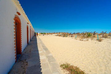 exhibition of anchors in the dune at the access to Barril beach, belonging to the Pedras del Rei village, Tavira, Algarve, Portugal.