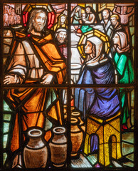 PIACENZA, ITALY - MAY 20, 2025: The Miracel in Cana in the stained glass of the Cathedral by A....