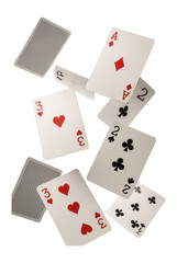 A collection of playing cards featuring various suits and numbers appears to be floating or falling on transparent background.