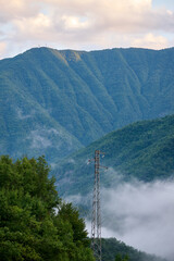 Obraz premium high voltage power line in the mountains