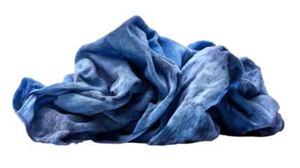 Blue textured cloth pile on black background