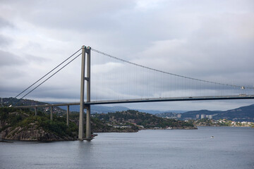 a shot of a bridge over the Norwegian fjord near Bergen in a cloudy day