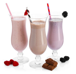 Different tasty milkshakes in glasses and ingredients isolated on white