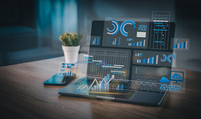 Modern business workspace showing digital analytics dashboard and project planning charts on laptop and smartphone, ideal for data-driven strategy and remote work concept.
