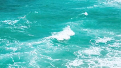 Presents a natural landscape of blue sea and white waves, conveying a fresh and tranquil ocean atmosphere.