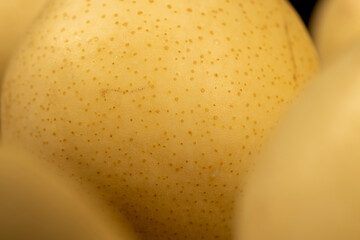 clean pears with yellow skins with small spots