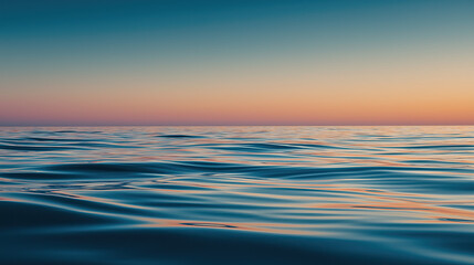 Obraz premium Peaceful ocean horizon at sunrise, soft colors and minimal waves