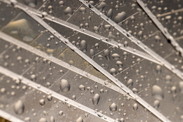 a wet blade for a knife closeup, a sharp blade for a knife for repair work covered with water