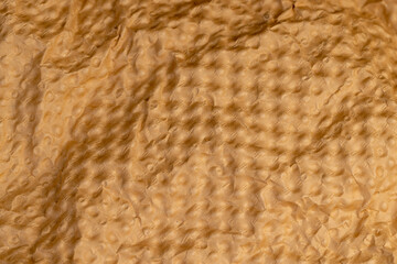 soft corrugated paper for transporting objects close up, paper details with a raised surface and a large number of irregularities