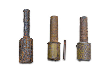 Row of four vintage flashbulbs and one tube on a neutral background, arranged in a line with signs of wear and age Lighting creates soft shadows Perspective is from above