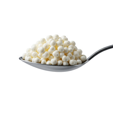 High-key product macro of a steel tablespoon holding mounded creamy small-curd cottage cheese with curds on transparent, concept of pristine simplicity