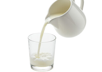 Fresh Milk Pouring into a Clear Glass, Isolated