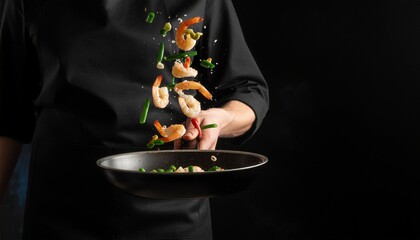 Chef Tossing Shrimp and Vegetables in a Frying Pan – Action Cooking Shot