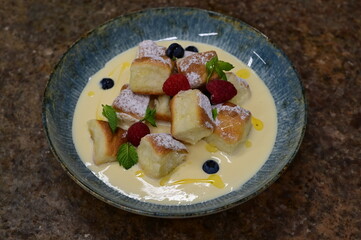 Popular traditional Czech dish served in a modern style, gourmet presentation in a restaurant,