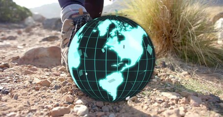 Female hiker holding smartphone walking rocky trail, causing technology globe rotating glowing grid - Powered by Adobe