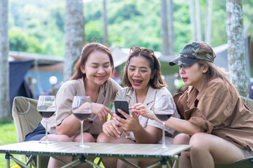 Outdoor Friends Gathering, Happy Women Camping, Wine and Technology