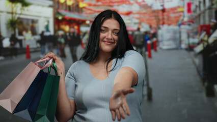 Curvy woman smiling with shopping bags on busy city street, vibrant outdoor scene emphasizing urban lifestyle and diversity in modern culture