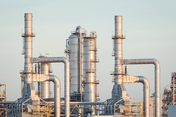 Distillation tank in petrochemical plant at Map Ta Phut Industrial Estate, Thailand under evening...