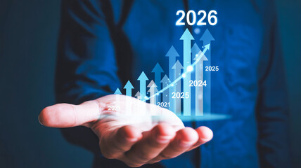 A digital visualization of a hand holding a holographic display showing a financial growth chart