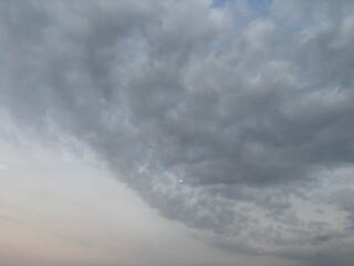 Dark, dramatic sky filled with ominous grey storm clouds. Moody and atmospheric natural background