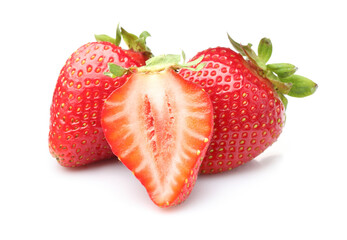 Whole and cut strawberries isolated on white